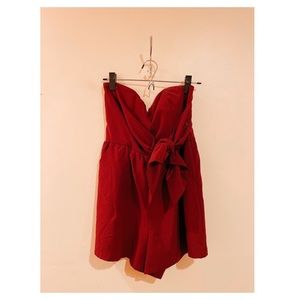 Maroon romper good for holiday season.